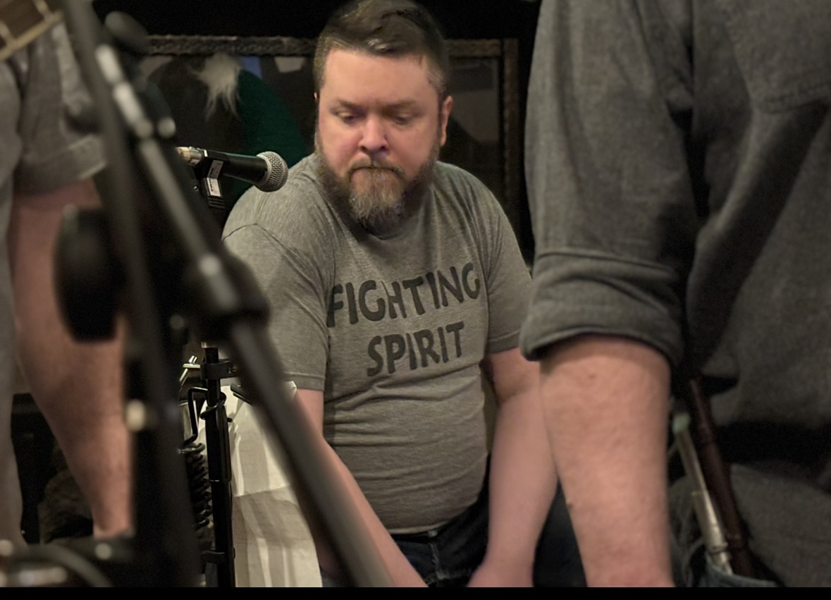 Guy Chelius plays percussion with vocals for Irish and Celtic band Down by the Glenside in centra pa